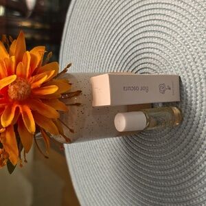 FLOR OSCURA ROLL ON SCENTED BODY OIL .17 oz BY PRIM